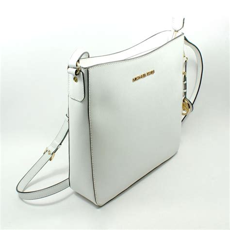 michael kors crossbody white and tourquoise|Michael Kors handbags.